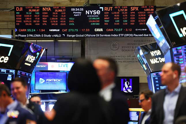 Image for article titled The Dow falls 300 points Tuesday, erasing earlier gains