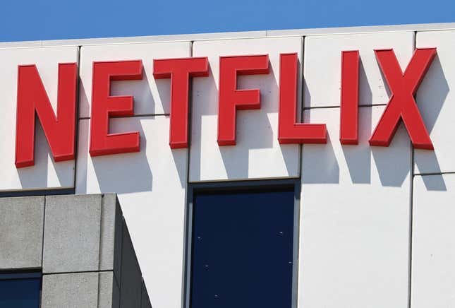 Netflix logo in big, all-capped red letters, on the side of a building