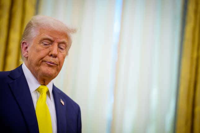 Image for article titled The Dow climbs 400 points as Trump backs off Powell and Tesla stock rallies