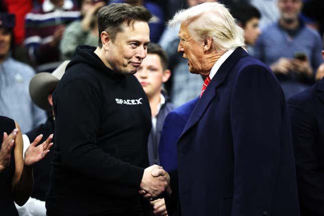 Elon Musk and Donald Trump shaking hands